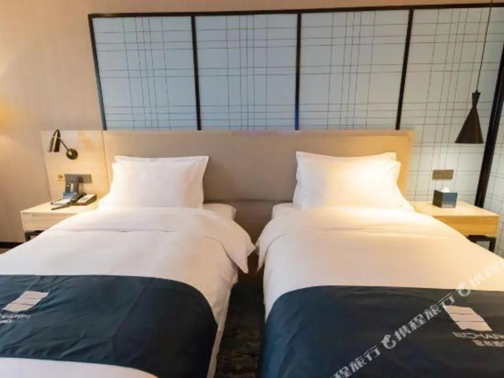Bed in Echarm Hotel Nanning Dongge Macun Metro Station