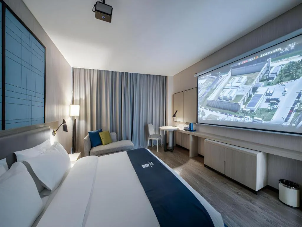 Bed in Echarm Hotel Nanning Dongge Macun Metro Station