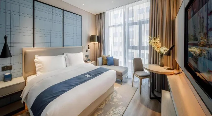 Bed in Echarm Hotel Nanning Dongge Macun Metro Station