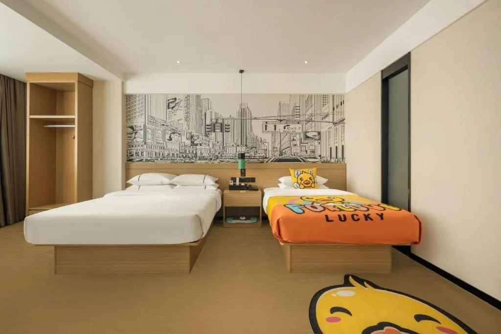 Bed in City Comfort Inn Wuzhou High-speed Railway Station Canghai Lake Park