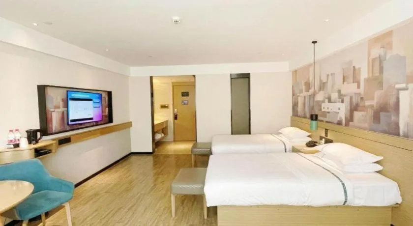 Bed in City Comfort Inn Wuzhou High-speed Railway Station Canghai Lake Park