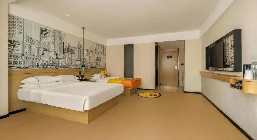 Bed in City Comfort Inn Wuzhou High-speed Railway Station Canghai Lake Park