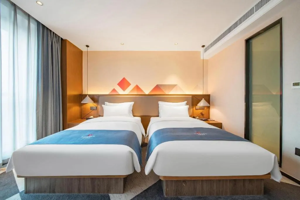 Bed in Borrman Hotel Ji'nan Aoti Center East Provincial Hospital