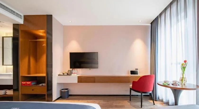 Bed in Borrman Hotel Ji'nan Aoti Center East Provincial Hospital