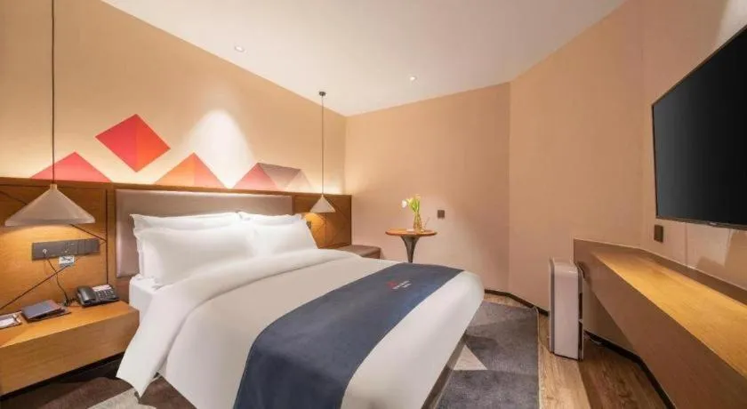 Bed in Borrman Hotel Ji'nan Aoti Center East Provincial Hospital