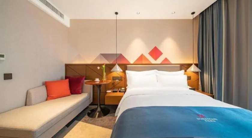 Bed in Borrman Hotel Ji'nan Aoti Center East Provincial Hospital