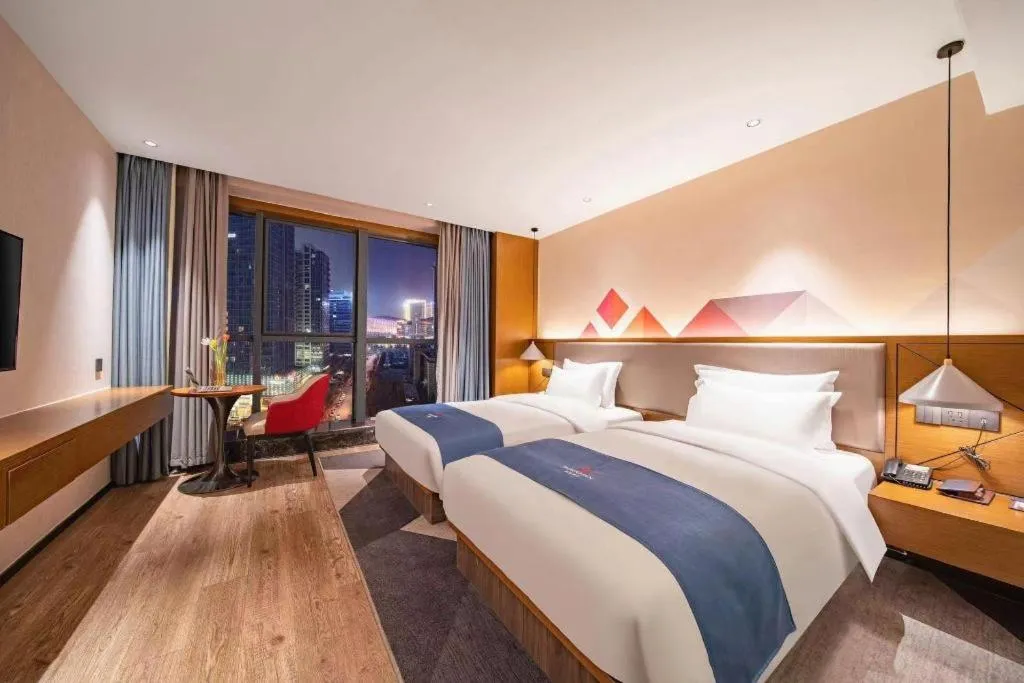 Bed in Borrman Hotel Ji'nan Aoti Center East Provincial Hospital