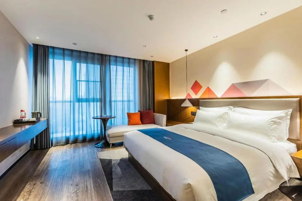 Bed in Borrman Hotel Ji'nan Aoti Center East Provincial Hospital