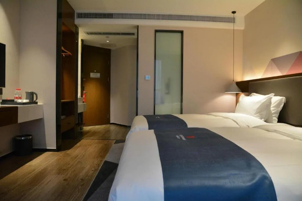 Bed in Borrman Hotel Ji'nan Aoti Center East Provincial Hospital