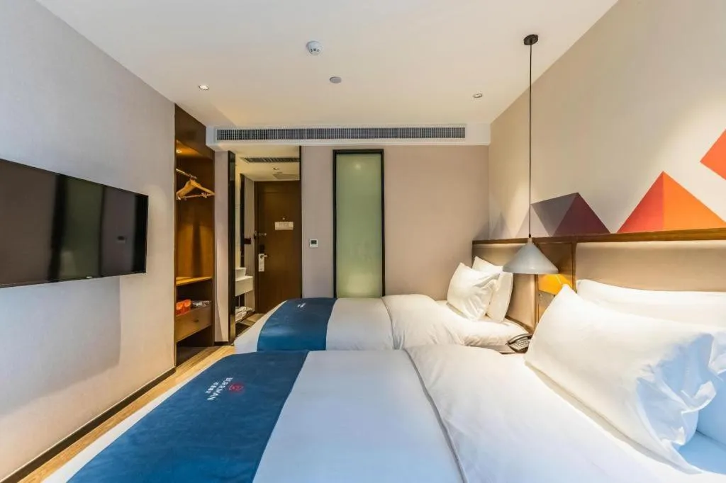Bed in Borrman Hotel Ji'nan Aoti Center East Provincial Hospital