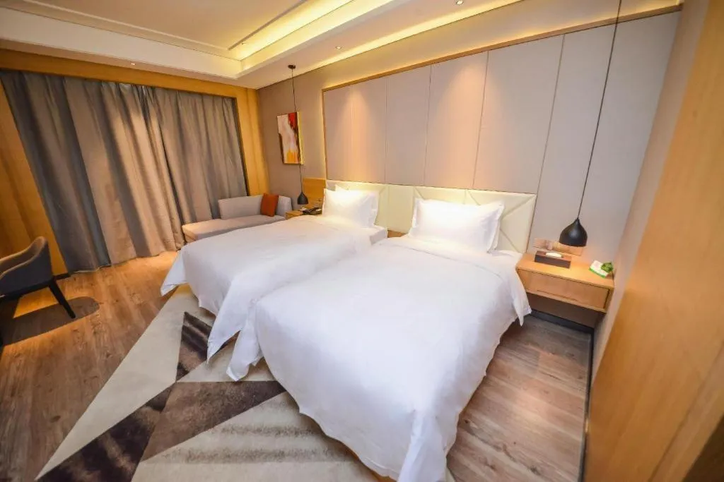 Bed in Borrman Hotel Ji'nan Aoti Center East Provincial Hospital