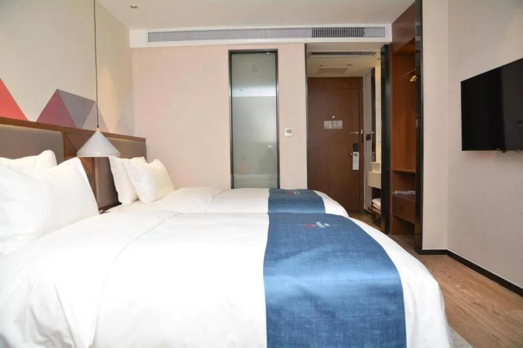 Bed in Borrman Hotel Ji'nan Aoti Center East Provincial Hospital