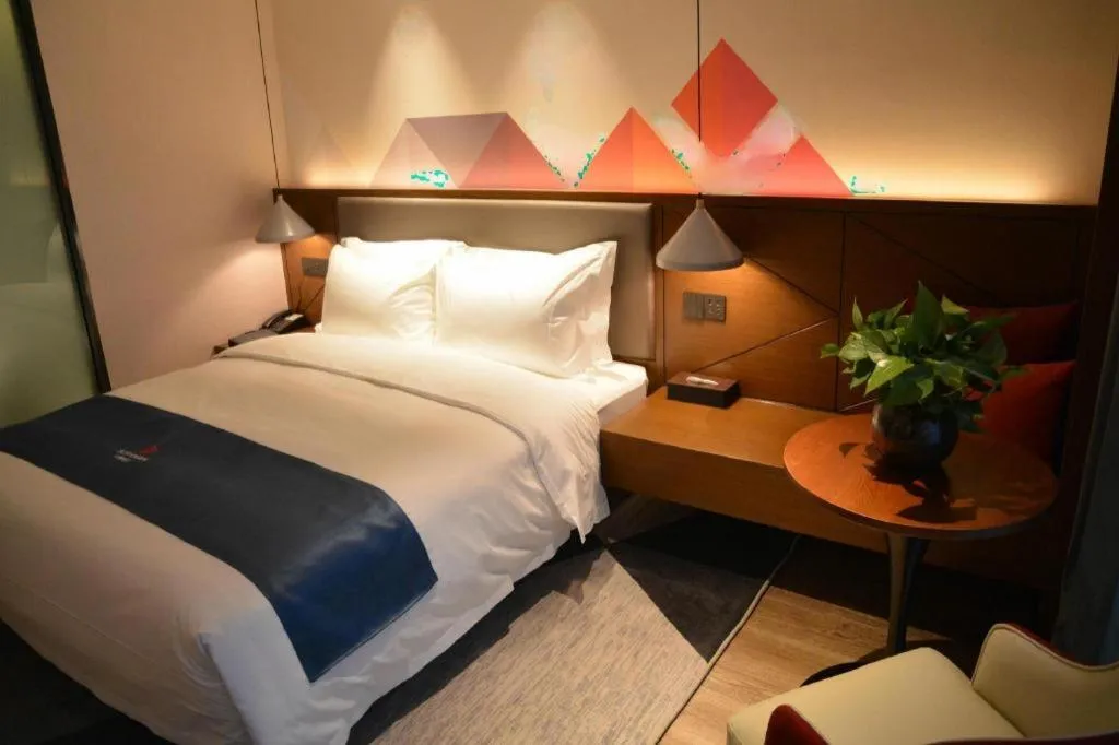 Bed in Borrman Hotel Ji'nan Aoti Center East Provincial Hospital