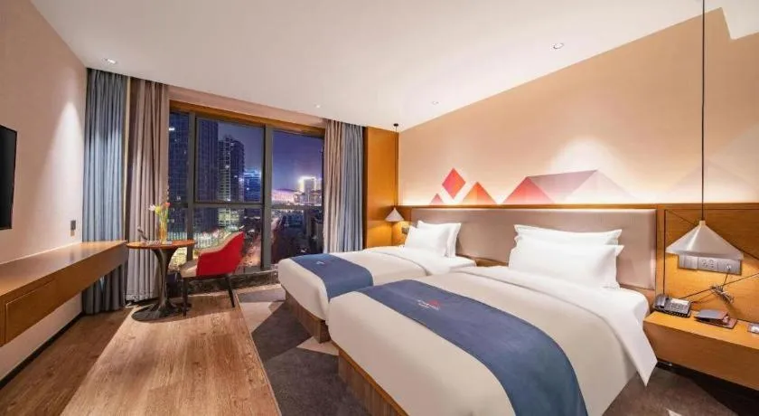 Bed in Borrman Hotel Ji'nan Aoti Center East Provincial Hospital