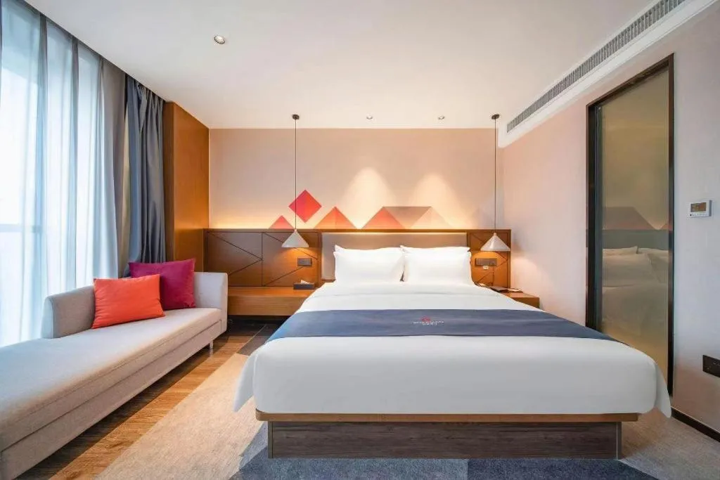 Bed in Borrman Hotel Ji'nan Aoti Center East Provincial Hospital