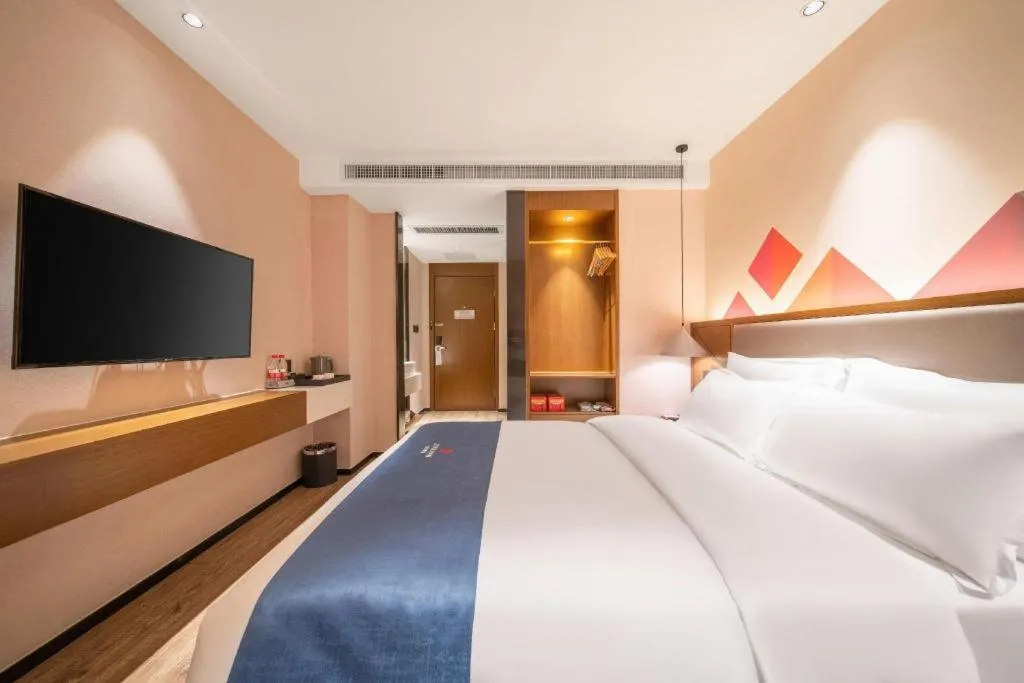 Bed in Borrman Hotel Ji'nan Aoti Center East Provincial Hospital