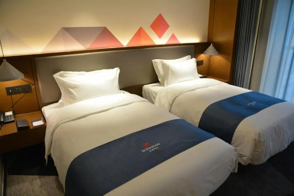 Bed in Borrman Hotel Ji'nan Aoti Center East Provincial Hospital
