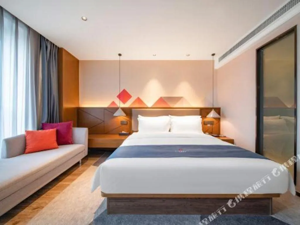 Bed in Borrman Hotel Ji'nan Aoti Center East Provincial Hospital