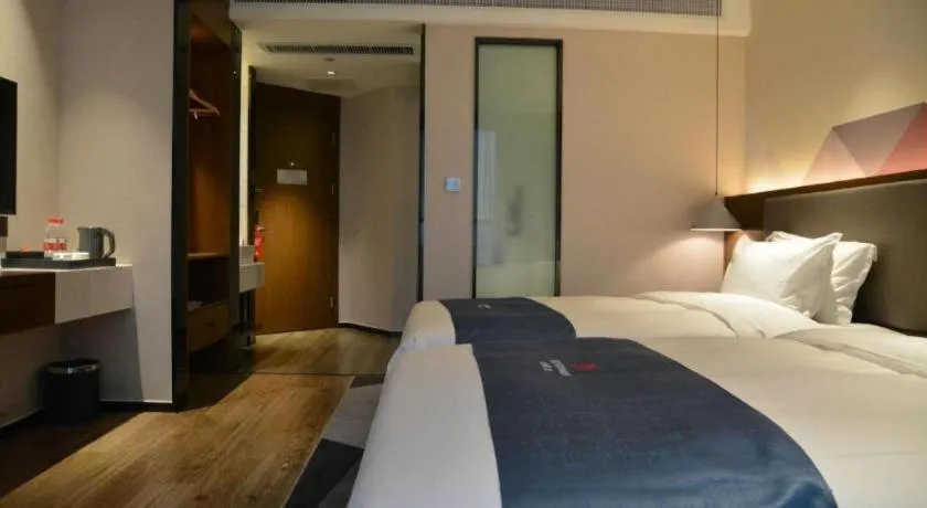 Bed in Borrman Hotel Ji'nan Aoti Center East Provincial Hospital