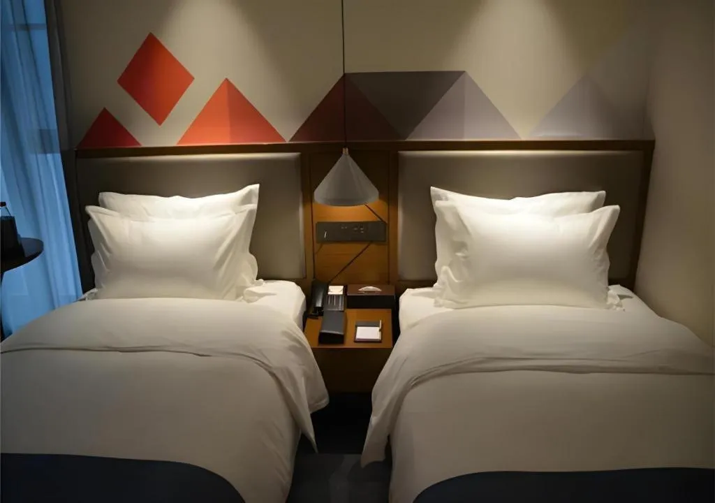 Bed in Borrman Hotel Ji'nan Aoti Center East Provincial Hospital