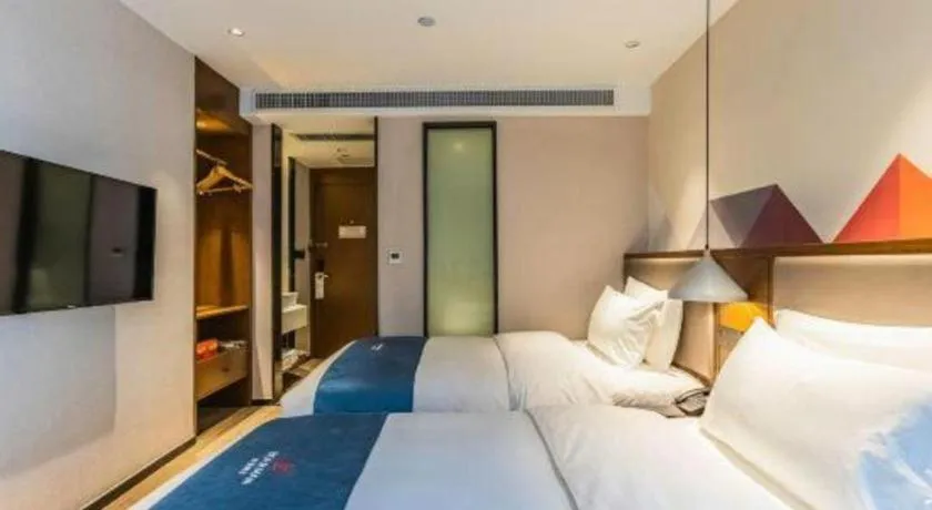 Bed in Borrman Hotel Ji'nan Aoti Center East Provincial Hospital