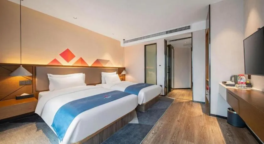 Bed in Borrman Hotel Ji'nan Aoti Center East Provincial Hospital