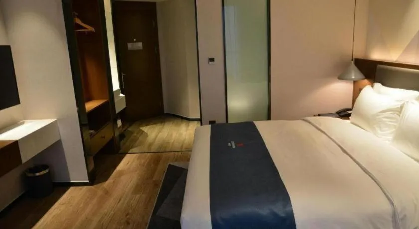 Bed in Borrman Hotel Ji'nan Aoti Center East Provincial Hospital