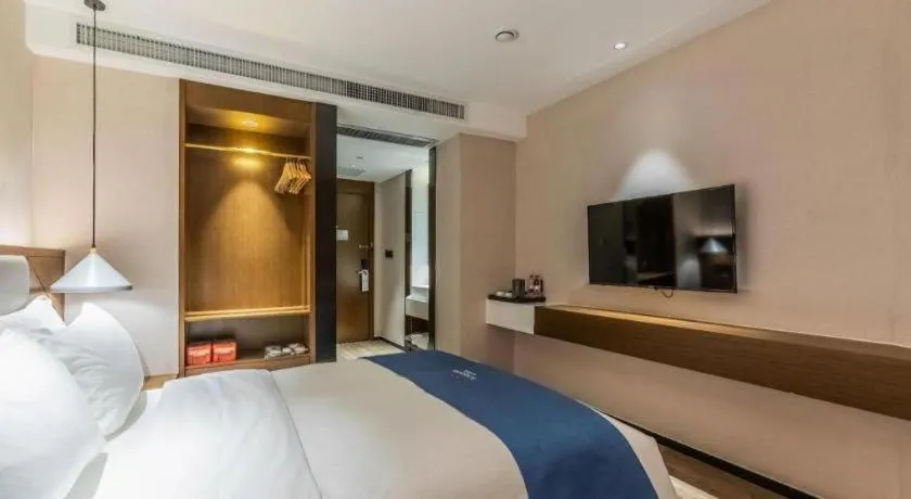 Bed in Borrman Hotel Ji'nan Aoti Center East Provincial Hospital