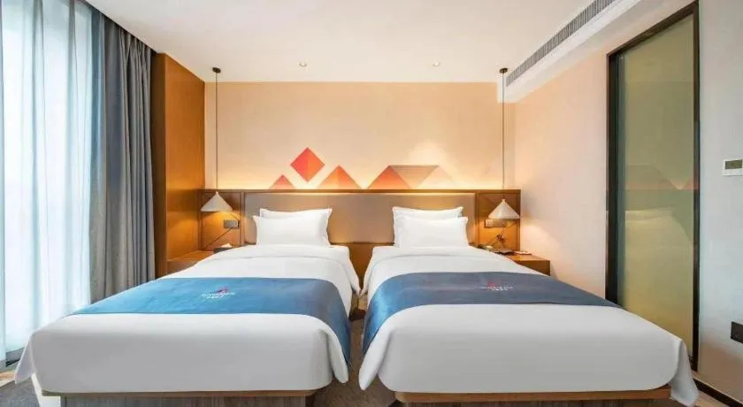 Bed in Borrman Hotel Ji'nan Aoti Center East Provincial Hospital