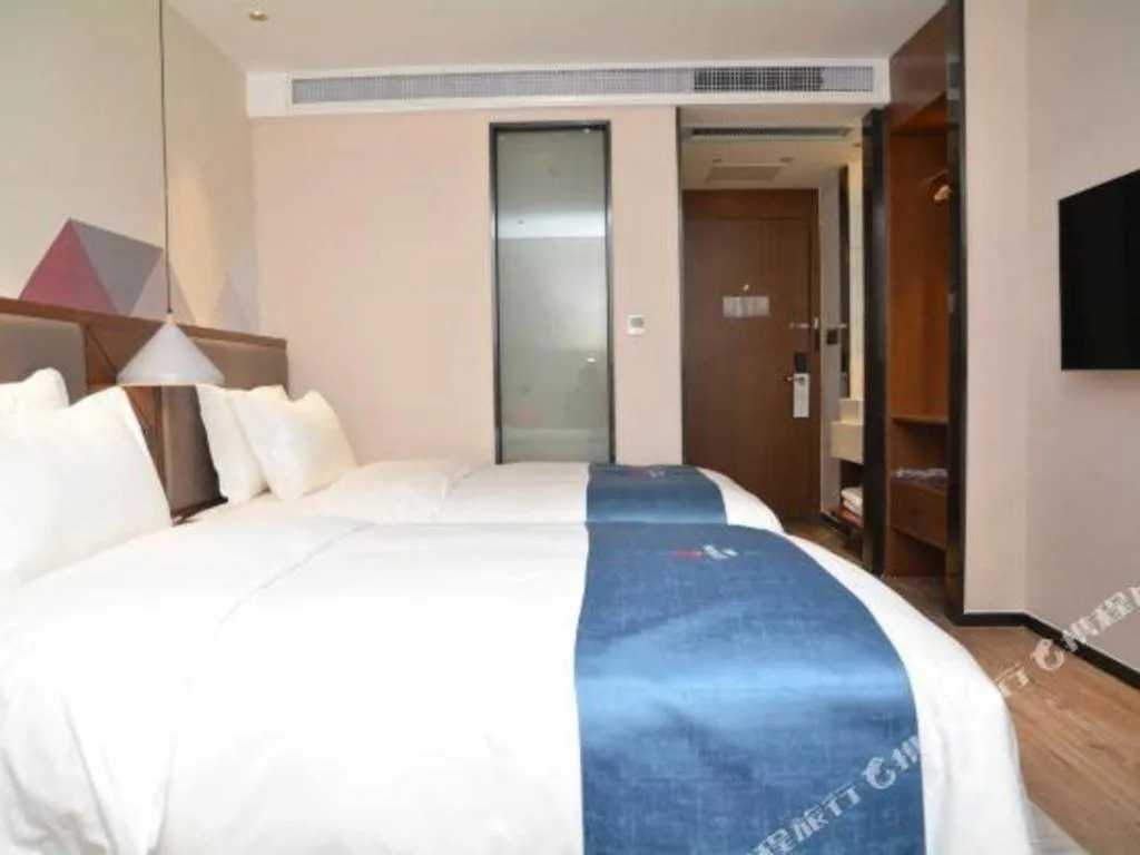 Bed in Borrman Hotel Ji'nan Aoti Center East Provincial Hospital