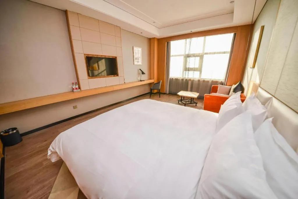 Bed in Borrman Hotel Ji'nan Aoti Center East Provincial Hospital