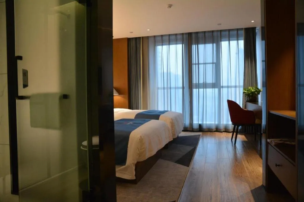 Bed in Borrman Hotel Ji'nan Aoti Center East Provincial Hospital