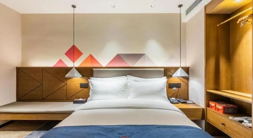 Bed in Borrman Hotel Ji'nan Aoti Center East Provincial Hospital