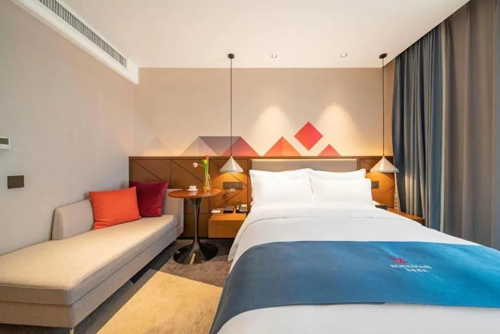 Bed in Borrman Hotel Ji'nan Aoti Center East Provincial Hospital