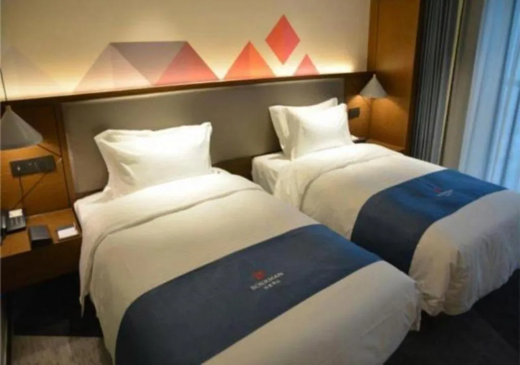 Bed in Borrman Hotel Ji'nan Aoti Center East Provincial Hospital