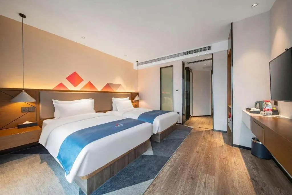 Bed in Borrman Hotel Ji'nan Aoti Center East Provincial Hospital