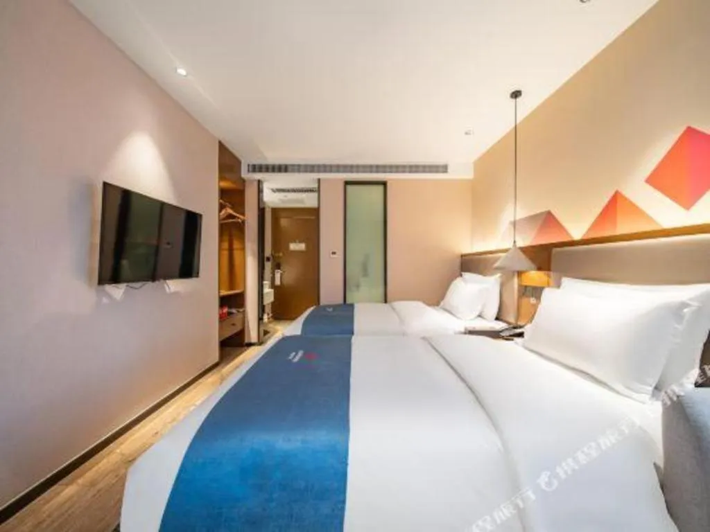 Bed in Borrman Hotel Ji'nan Aoti Center East Provincial Hospital