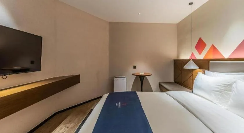 Bed in Borrman Hotel Ji'nan Aoti Center East Provincial Hospital