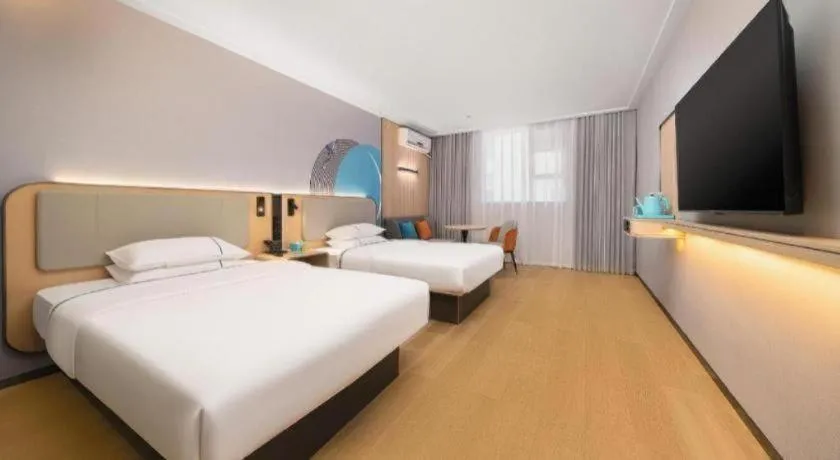 Bed in City Comfort Inn Liuzhou Luzhai Walking Street