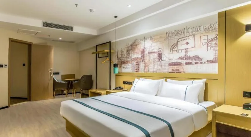 Bed in City Comfort Inn Liuzhou Liucheng