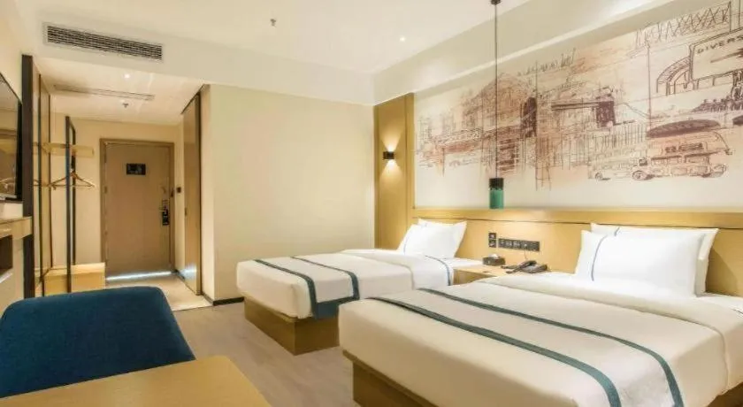 Bed in City Comfort Inn Liuzhou Liucheng