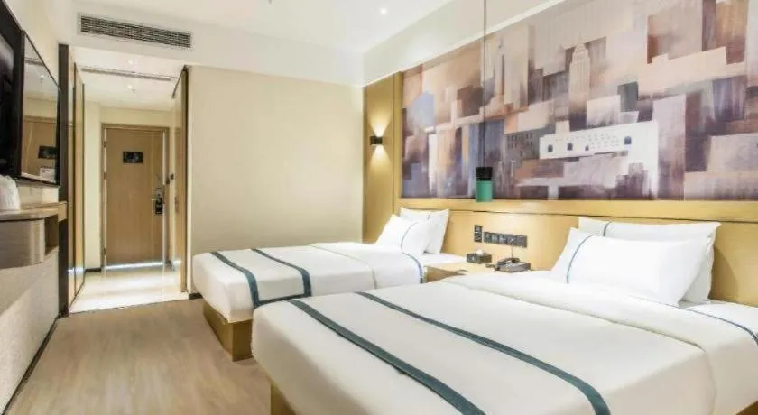 Bed in City Comfort Inn Liuzhou Liucheng