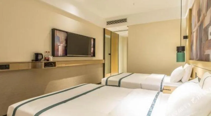 Bed in City Comfort Inn Liuzhou Liucheng