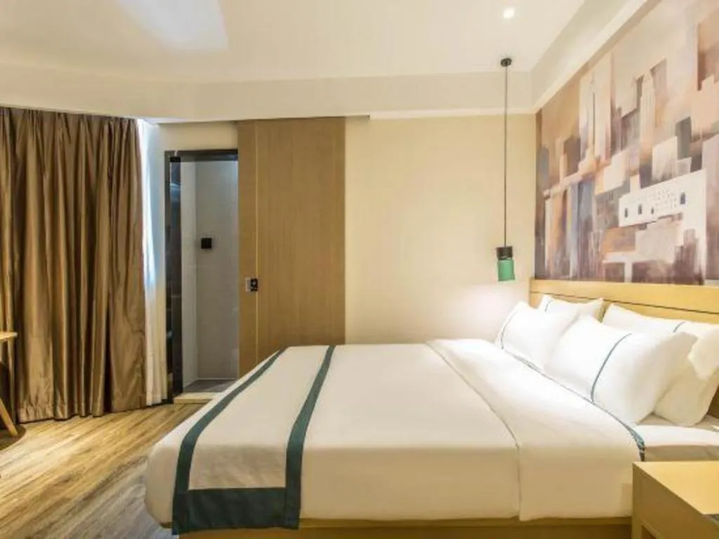 Bed in City Comfort Inn Liuzhou Liucheng