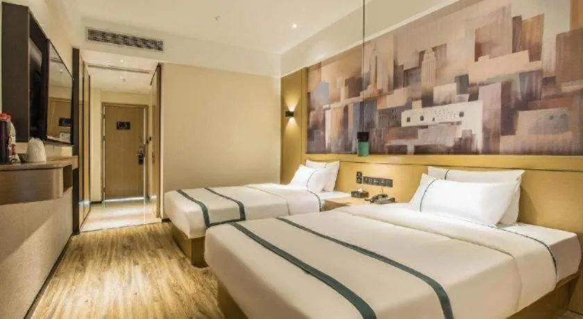 Bed in City Comfort Inn Liuzhou Liucheng