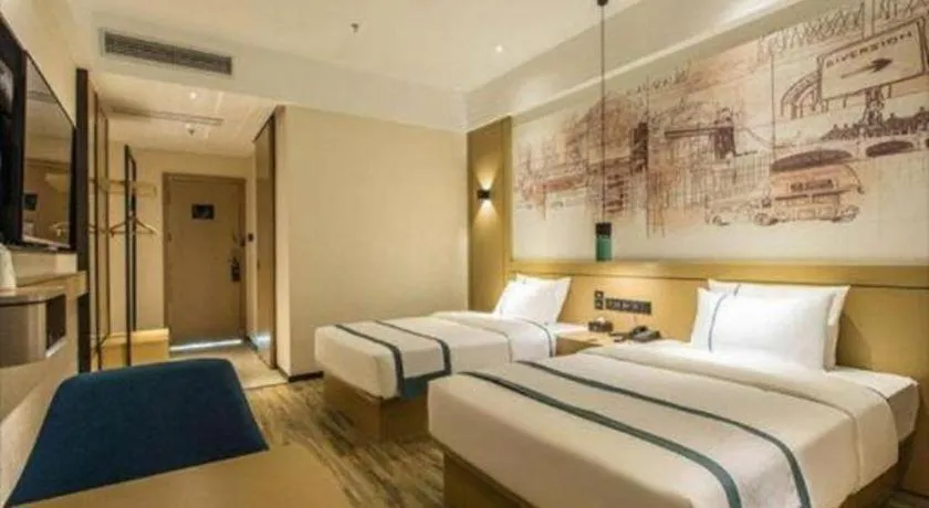 Bed in City Comfort Inn Liuzhou Liucheng