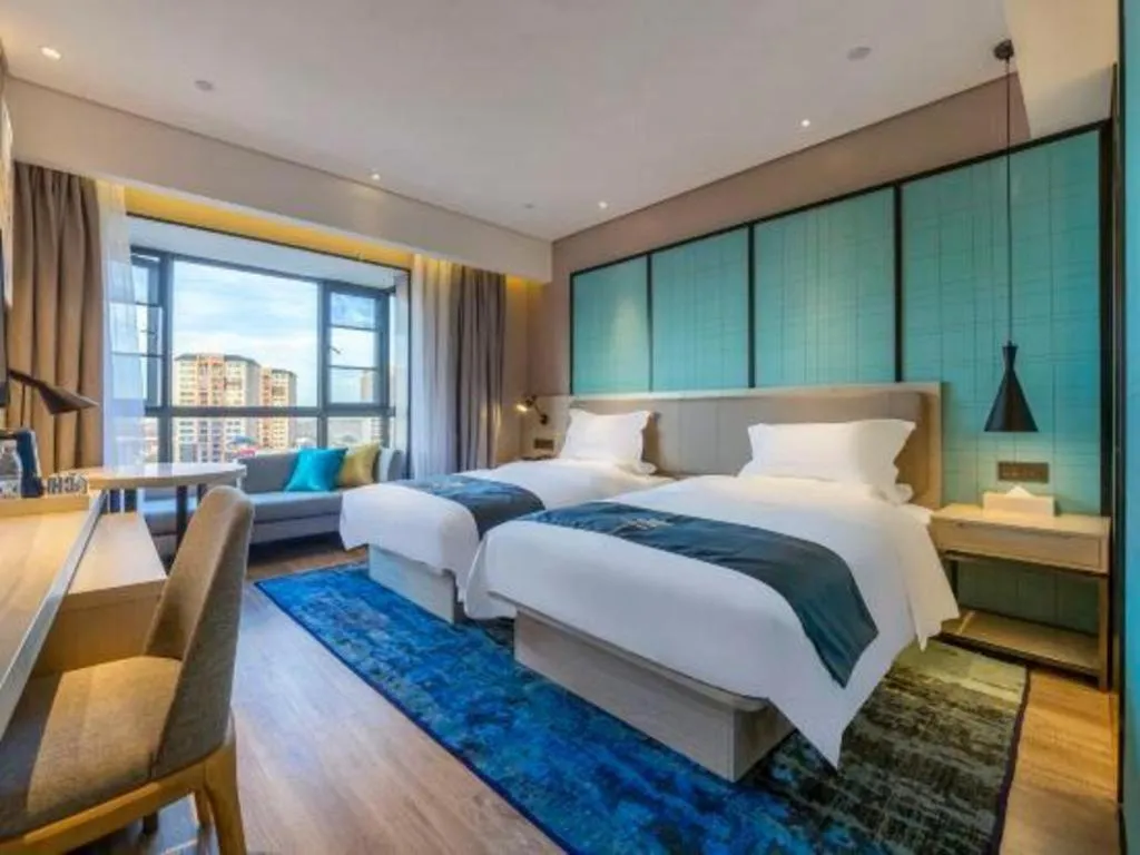 Bed in Echarm Hotel Kunming High-speed Railway South Station Chunrong Street Metro Station