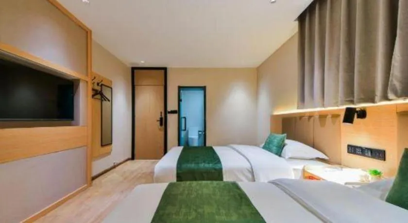 Bed in Echarm Hotel Kunming High-speed Railway South Station Chunrong Street Metro Station