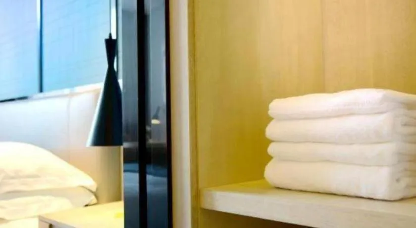 Bed in Echarm Hotel Kunming High-speed Railway South Station Chunrong Street Metro Station