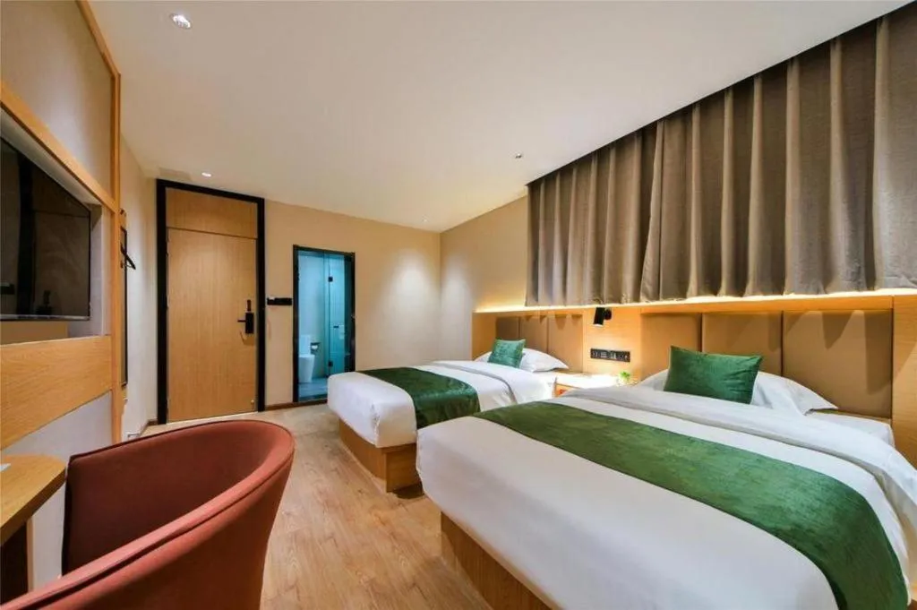Bed in Echarm Hotel Kunming High-speed Railway South Station Chunrong Street Metro Station